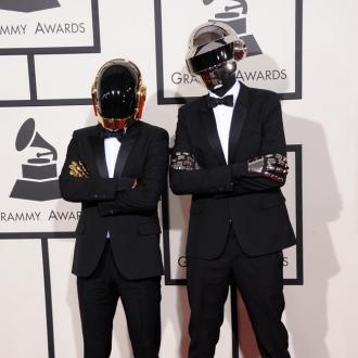 Daft Punk perform with Stevie Wonder at Grammys