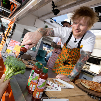 Ed Sheeran stuns shoppers by signing 'sauceographs' at British supermarket