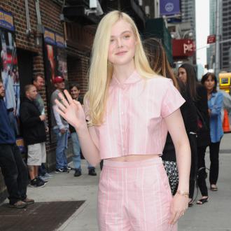 Elle Fanning dressed up as Sleeping Beauty as kid