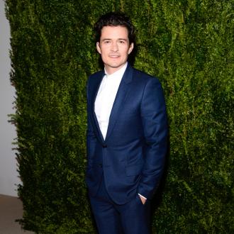 Orlando Bloom squeezed Stern nice and tight at Aniston wedding