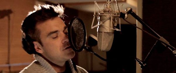 Robbie Williams recording He Ain't Heavy Still