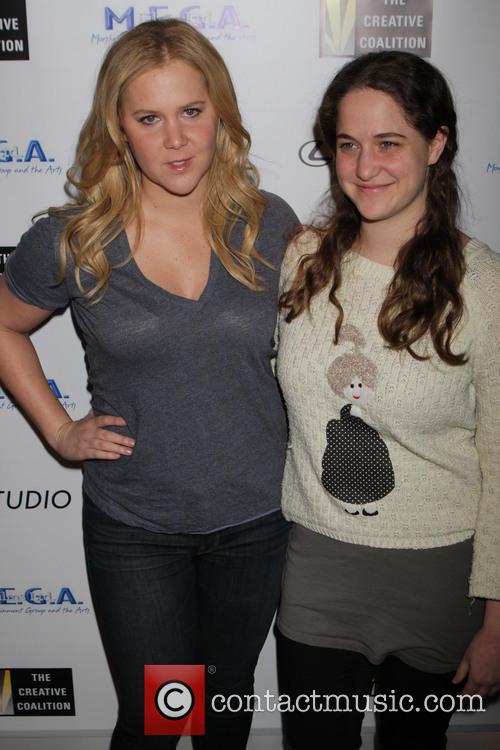 Amy Schumer and Kim Caremele