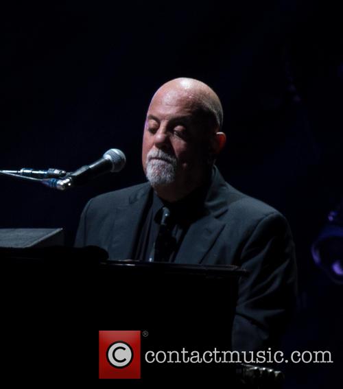 Billy Joel performing at Wembley