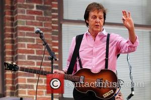 Paul McCartney  performing live on the marquee of the Ed Sullivan Theater for CBS's 'Late Show with David Letterman.'...