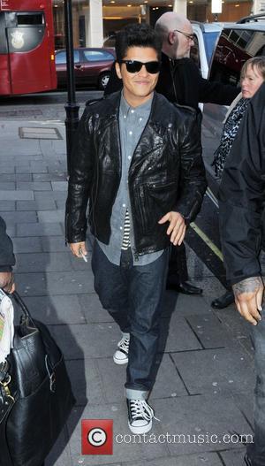 Bruno Mars arriving at the BBC Radio One studios London, England - 19.01.11