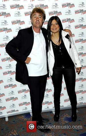 Glen Matlock (Sex Pistols) and female companion attend the East End Film Festival for the World Premiere of 'The Libertines...