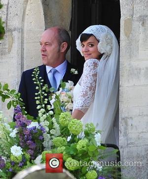 Lily Allen, alongside her father Keith Allen, arriving for her wedding to Sam Cooper Cranham, Gloucestershire - 11.06.11