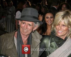 Keith Richards and model Patti Hansen Pirates Of The Caribbean: On Stranger Tides World Premiere held at Disneyland Anaheim, California...