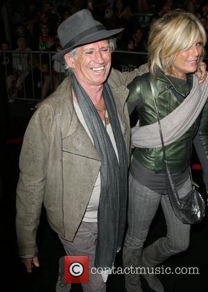 Keith Richards and model Patti Hansen Pirates Of The Caribbean: On Stranger Tides World Premiere held at Disneyland Anaheim, California...