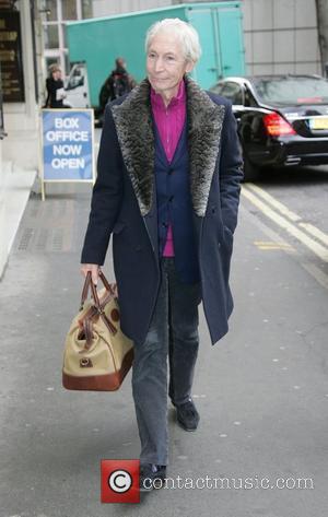 Rolling Stones drummer Charlie Watts walking in London's West End London, England - 09.03.11