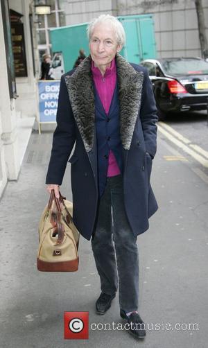 Rolling Stones drummer Charlie Watts walking in London's West End London, England - 09.03.11