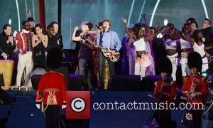 Paul McCartney performs with Will.i.am, Cheryl Cole, Annie Lennox and others at The Diamond Jubilee Concert at Buckingham Palace. London,...