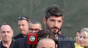 George Michael and his boyfriend Fadi Fawaz arrive at Hyde Park to watch Madonna's 'MDNA' concert London, England - 17.07.12