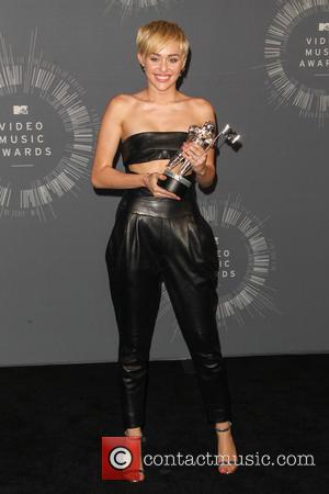 Miley Cyrus - 2014 MTV Video Music Awards at The Forum - Press Room - Inglewood, California, United States -...