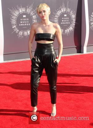 Miley Cyrus - 2014 MTV Video Music Awards at The Forum - Arrivals - Los Angeles, California, United States -...