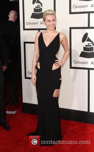 Miley Cyrus - A variety of stars from the music industry all turned out in style to attend the 57th...