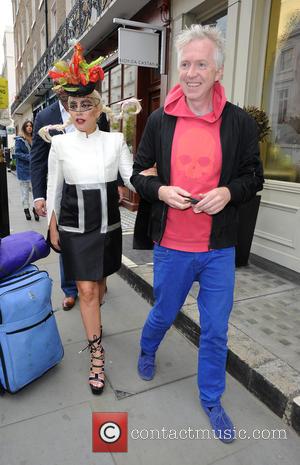 Lady Gaga - Lady Gaga leaves the Langham hotel, and is greeted by a gigantic cake that had been made...