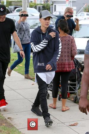 Justin Bieber - Justin Bieber spotted leaving a public restroom in Beverly Hills - Los Angeles, California, United States -...