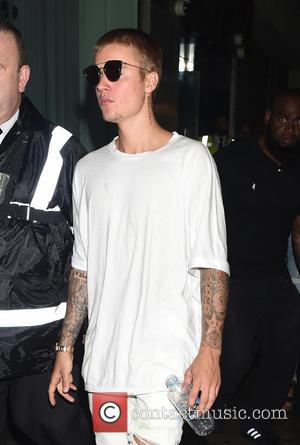 Justin Bieber seen leaving Tape Nightclub at 3.45am after partying up a storm with Rihanna ahead of V Festival, London,...