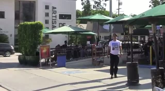 Anthony Kiedis From Red Hot Chili Peppers Kisses A Woman At Urth Cafe