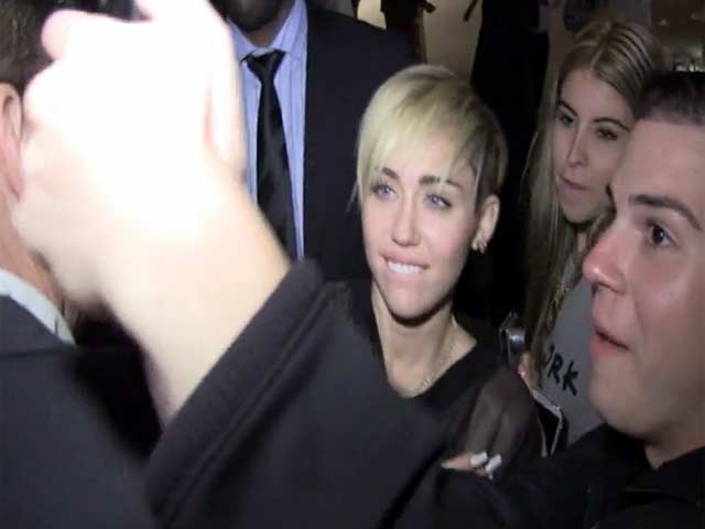 Miley Cyrus Has Photos With Fans At The SNL Afterparty