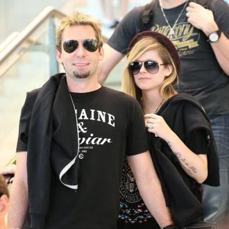 Avril Lavigne and Chad Kroeger make music