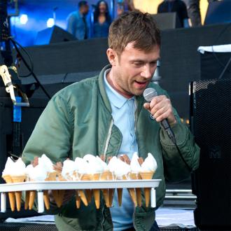 Blur's Damon Albarn hands out ice creams