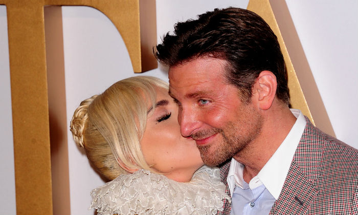 Lady Gaga and Bradley Cooper at the premiere of A Star Is Born (Photo Credit: Maurice Clements/Famous)