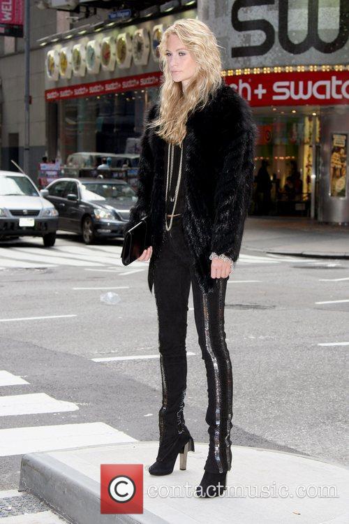 Poppy Delevigne and Times Square 1