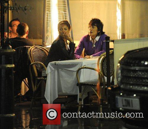 Ronnie Wood, His Girlfriend Ana Araujo Pop Outside For A Cigarette Break and During A Meal Together At A Restaurant In Mayfair.