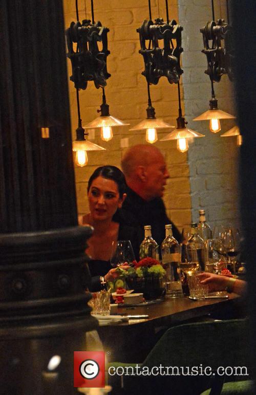 Bruce Willis and His Wife Emma Heming-willis Having Dinner