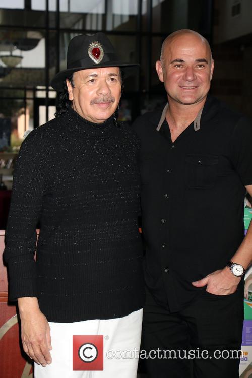 Carlos Santana and Andre Agassi 6