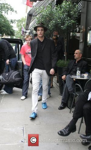 Blake Fielder storms out of a Covent Garden Hotel not looking happy and with his face covered with scratches. After...