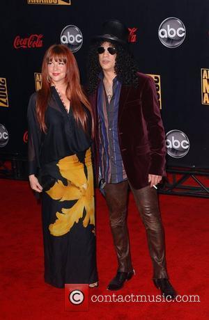 Slash and wife 2007 American Music Awards held at the at the Nokia Theatre - Arrivals Los Angeles, California -...