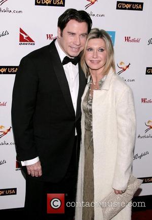 Olivia Newton-John and John Travolta The G'Day USA Australia.com Black Tie Gala Grand Ballroom, Hollywood and Highland Los Angeles, California...