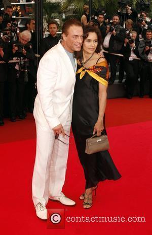 Jean-Claude Van Damme and guest The 2008 Cannes Film Festival - Day 3 - Un Conte De Noel - Premiere...