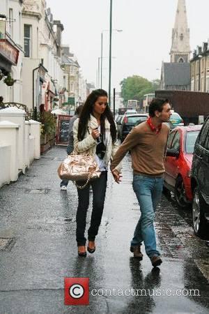 Chantelle Houghton and Samuel Preston getting caught in the rain whilst going for a coffee Brighton, England - 21.05.07