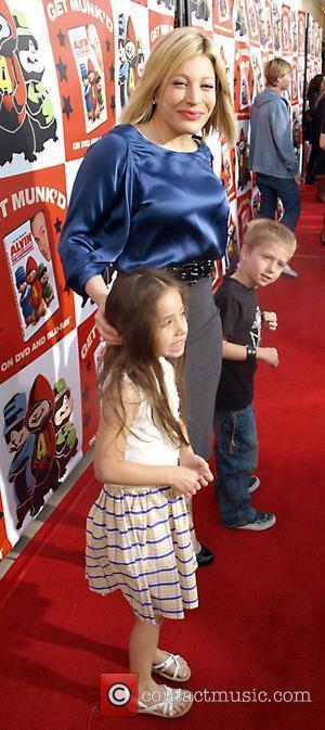 Taylor Dayne and children attend the Dvd Release party for the film Alvin and the Chipmunks, held at El Rey...