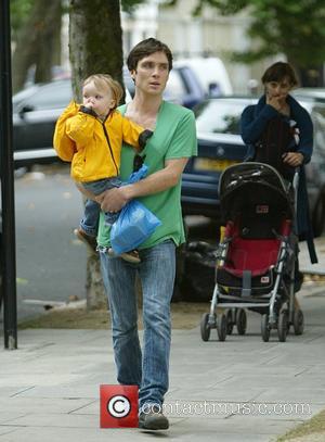 Cillian Murphy goes out with his son to the buy some groceries, wearing an anorak in case of rainfall London,...