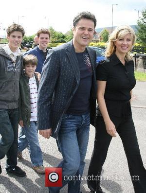 Donny Osmond with wife Debbie Osmond and children visited the 'Joseph Parry Museum' and talked to a local resident that...