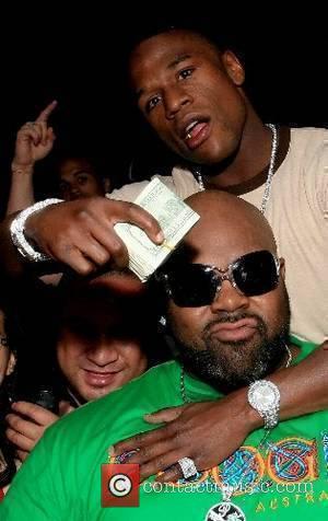 Suge Knight and Undefeated pro boxer 'Pretty Boy' Floyd Mayweather Jr., former WBC lightweight and featherweight world champion and top...