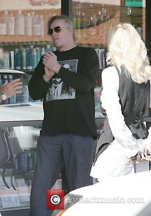 Gary Busey talking a to a lady outside Bay Cities Beauty Store in Cross Creek, Malibu Malibu, California - 31.03.08