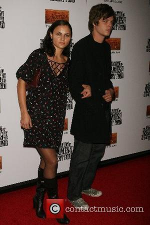 Rain Phoenix and Jesse James