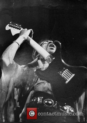 Rock star Jimi Hendrix during a performance.