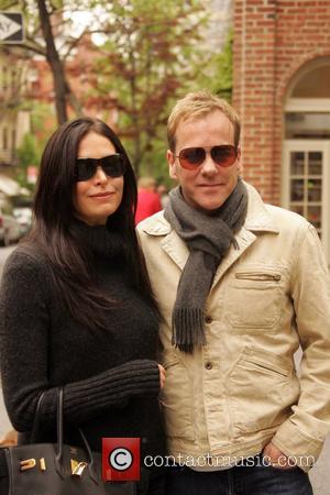 Kiefer Sutherland going for a walk with his girlfriend in the West Village after having lunch New York City, USA...