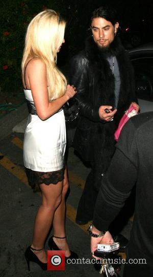 Dave Navarro and girlfriend Nicole Bennett leaving Les Deux nightclub Los Angeles, California - 03.10.07