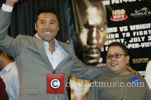 Oscar De La Hoya meets Cruz Baraja as party of the Make A Wish Foundation. The foundation makes it possible...