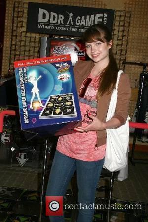 Daveigh Chase poses with the popular dancing arcade game, Dance Dance Revolution Melanie Segal's 2007 MTV Movie Awards Platinum Luxury...