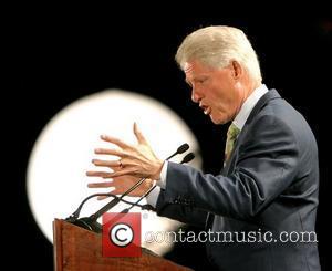 Former President of United States Bill Clinton  campaigns for his wife, Democratic presidential candidate Hillary Clinton, at Andre Agassi...