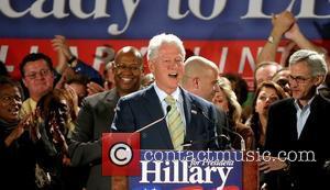 Former President of United States Bill Clinton and Andre Agassi Former President of United States Bill Clinton campaigns for his...